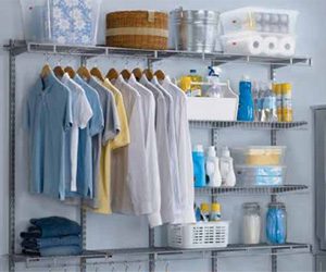 Organized clothing and household items on wire shelving in a laundry room.