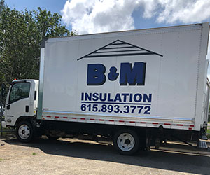Side of B&M Insulation company truck.